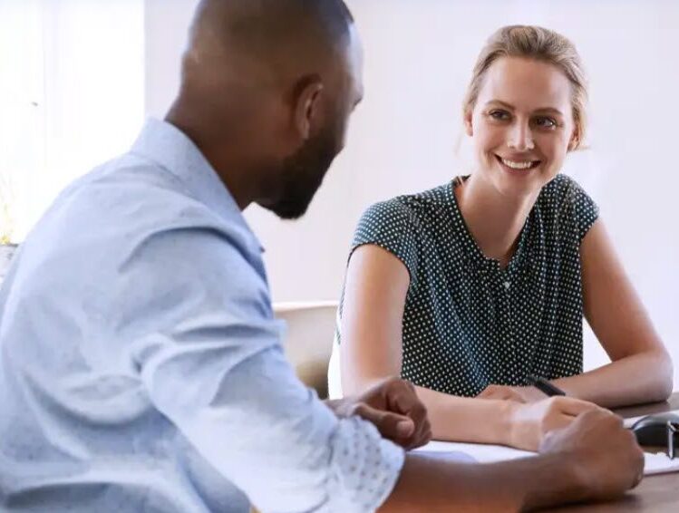 Employees Meeting to Work on Goals